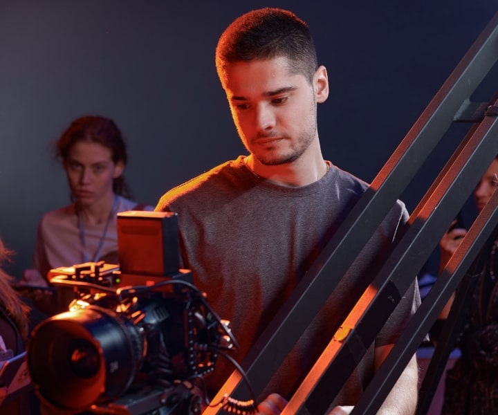 Film director monitoring a camera